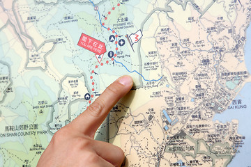 Image showing Close up of a hand pointing out location on the map. 