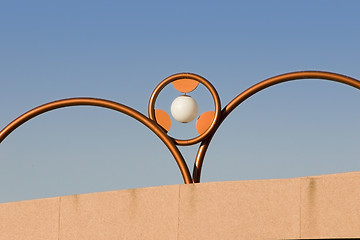 Image showing Unique Brass Lighting along the Bridge