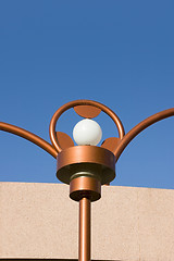 Image showing Close up on a Unique Brass Lighting along the Bridge