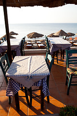 Image showing Restaurant tables in Perissa, Santorini, Greece