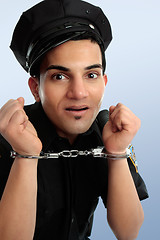 Image showing Policeman with handcuffs