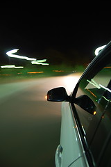 Image showing night drive with car in motion 