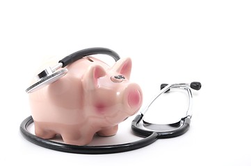 Image showing stethoscope and piggy bank
