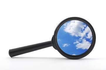 Image showing blue sky and magnifying glass