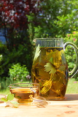 Image showing cup of tea in the garden