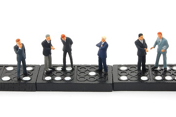 Image showing business man on domino 