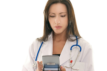 Image showing Doctor referencing information on a portable device