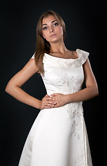 Image showing Beautiful girl in a white wedding dress