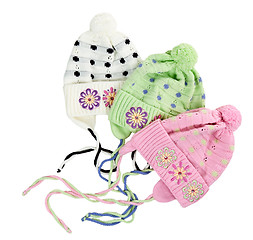 Image showing three colored children's knitted hat with a flower pattern