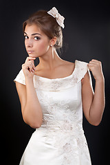 Image showing Beautiful girl in a white wedding dress