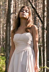 Image showing girl in a dress in a forest