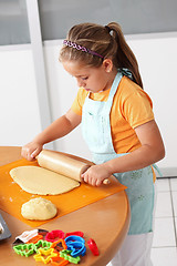 Image showing Child baking cookies