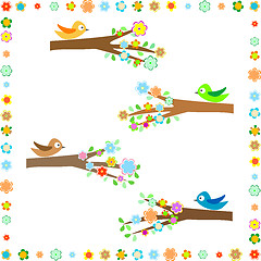 Image showing Birds sitting on different tree branches with flower decor