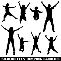 Image showing Silhouette happy jumping family