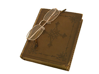 Image showing Old book and gold-rimmed spectacles