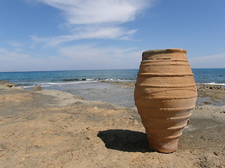 Image showing A pot on the seashore