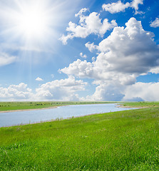 Image showing sun over river