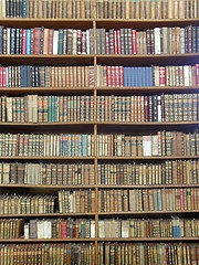 Image showing Rows of books on library shelves
