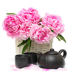 Image showing Chinese tea set and pink peony flower isolated on white