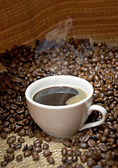 Image showing Coffee cup with roasted beans