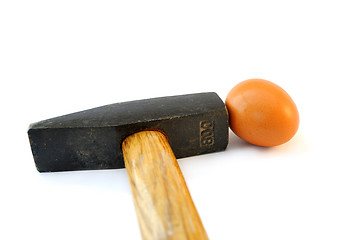 Image showing Hammer and egg