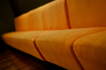 Image showing beige sofa in the room with dark green walls close up