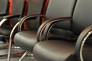 Image showing black leather office chair close-up