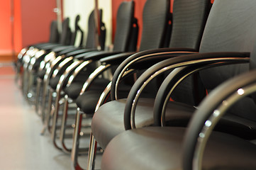 Image showing black leather office chair close-up