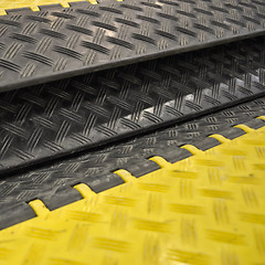 Image showing black-yellow speed bumps Humps