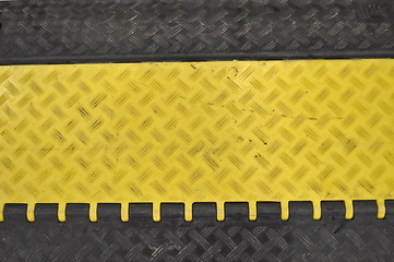 Image showing black-yellow speed bumps Humps