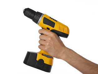 Image showing Battery drill in left hand