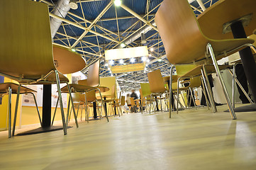 Image showing Chairs stand on the floor