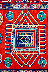 Image showing colored wool handmade carpet closeup