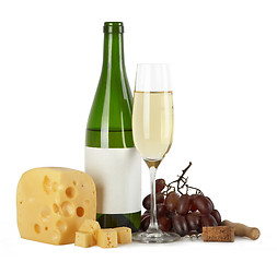 Image showing Bottle and glass of white wine with cheese