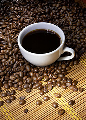 Image showing Coffee cup with roasted beans