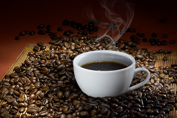 Image showing Coffee cup with roasted beans