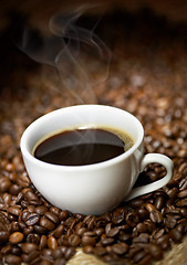 Image showing Coffee cup with roasted beans