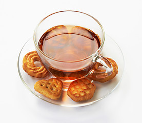 Image showing Cup of hot tea with cookies