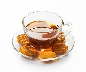 Image showing Cup of hot tea with cookies