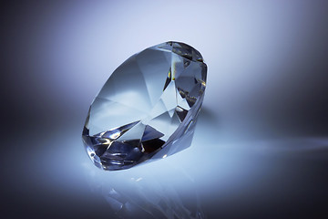 Image showing Diamond jewel on dark blue