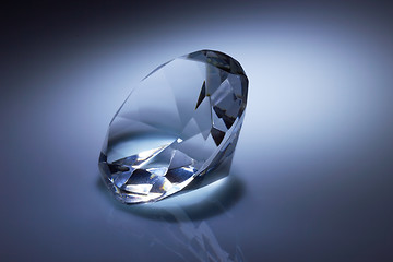 Image showing Diamond jewel on dark blue