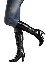 Image showing Female feet in high boots