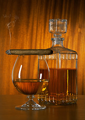 Image showing Glass of whisky with cigar