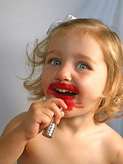 Image showing girl with lipstick