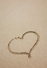 Image showing heart on sea sand