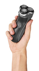 Image showing Electric shaver in hand