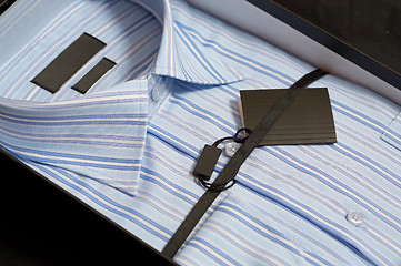 Image showing New man's shirt of blue colour in a gift box