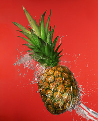Image showing pineapple in water splashes