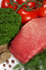 Image showing Raw fresh meat with tomato