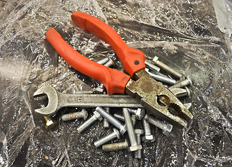 Image showing combination pliers wrench bolts